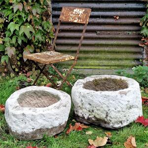 2 handcarved primitive stone planters