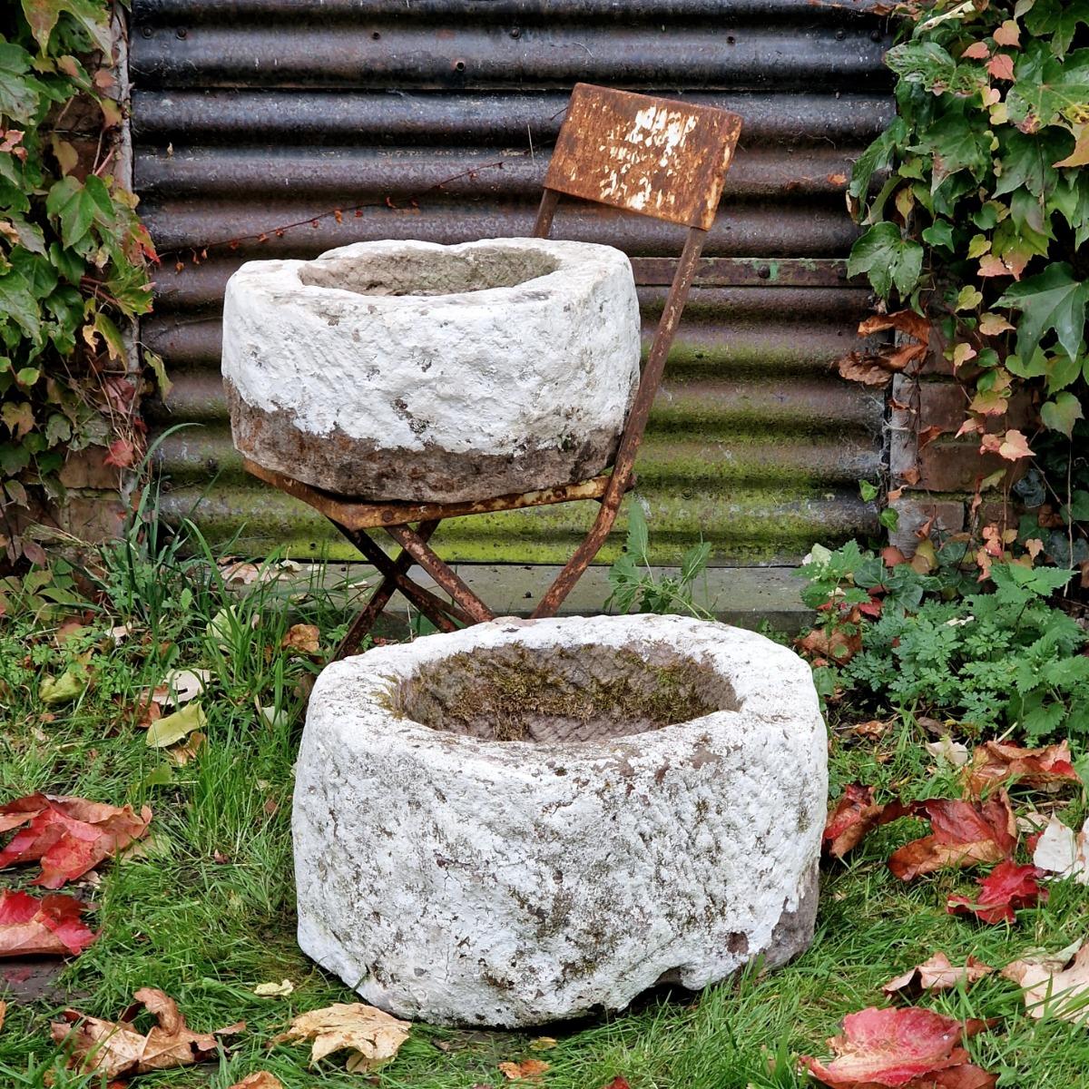 2 handcarved primitive stone planters