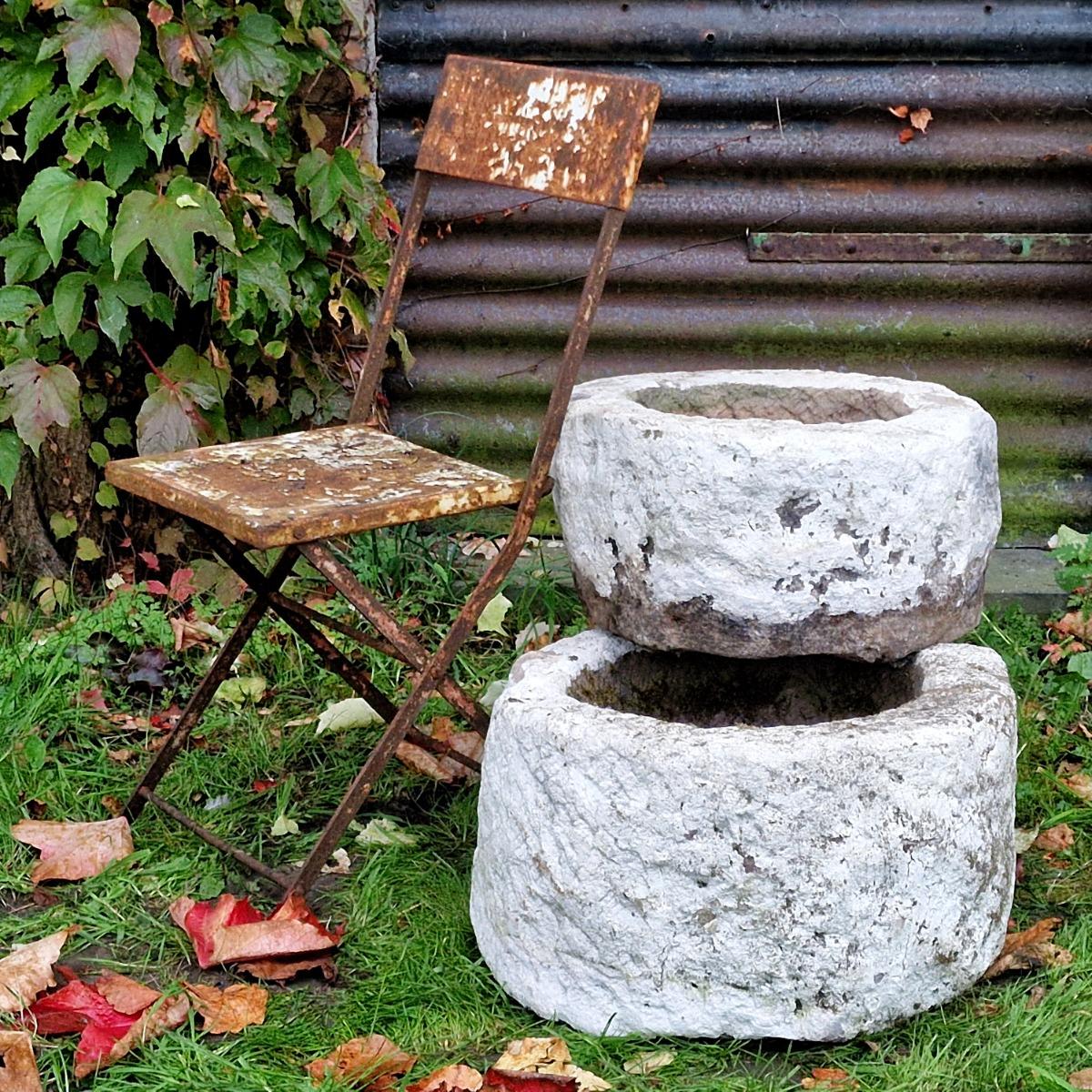 2 handcarved primitive stone planters