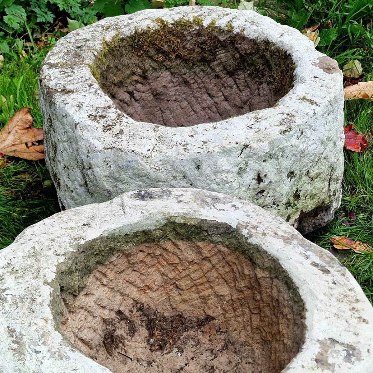 2 handcarved primitive stone planters