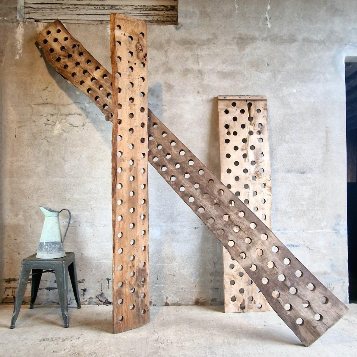 3 perforated wooden shelves