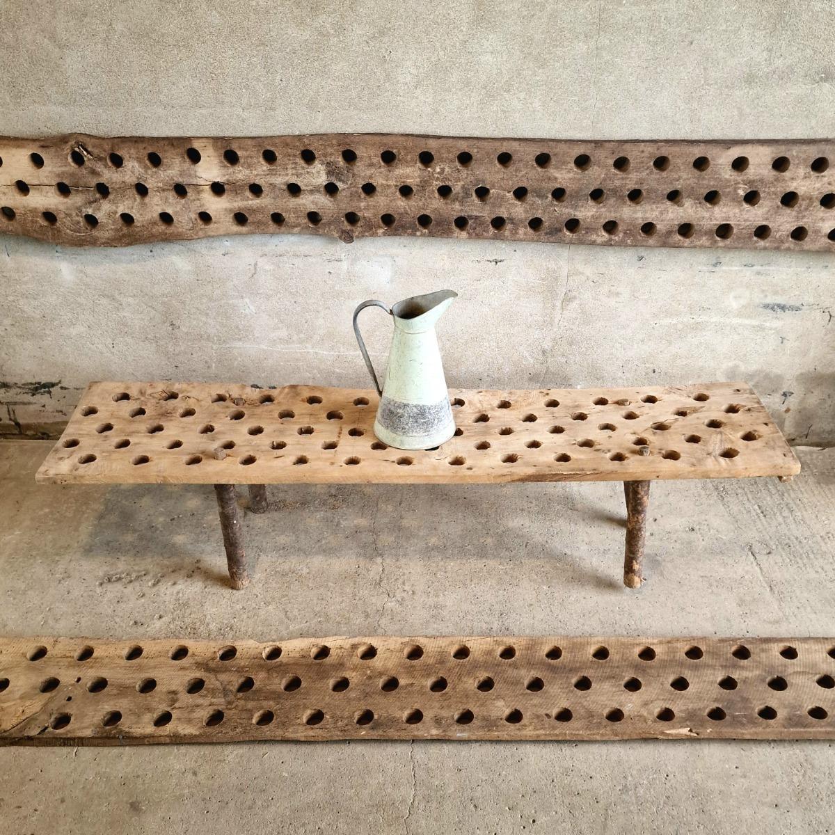 3 perforated wooden shelves