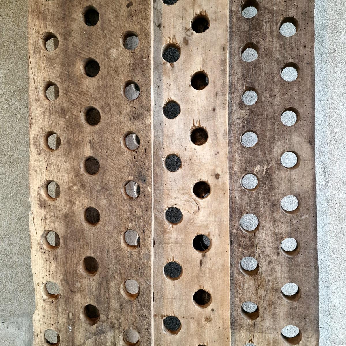 3 perforated wooden shelves