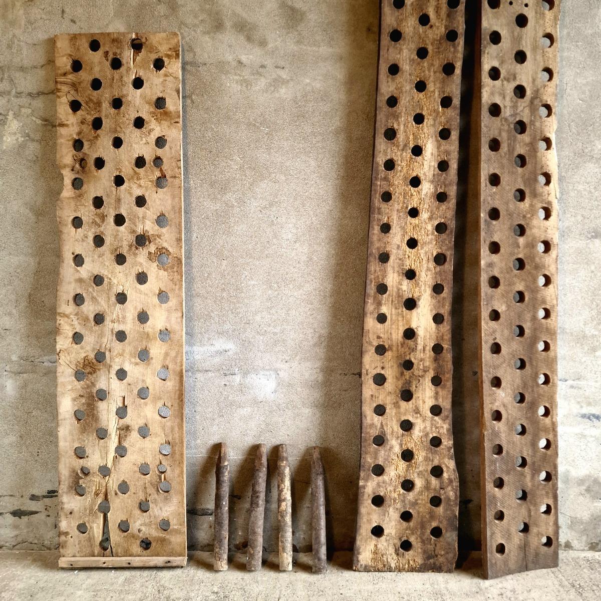 3 perforated wooden shelves