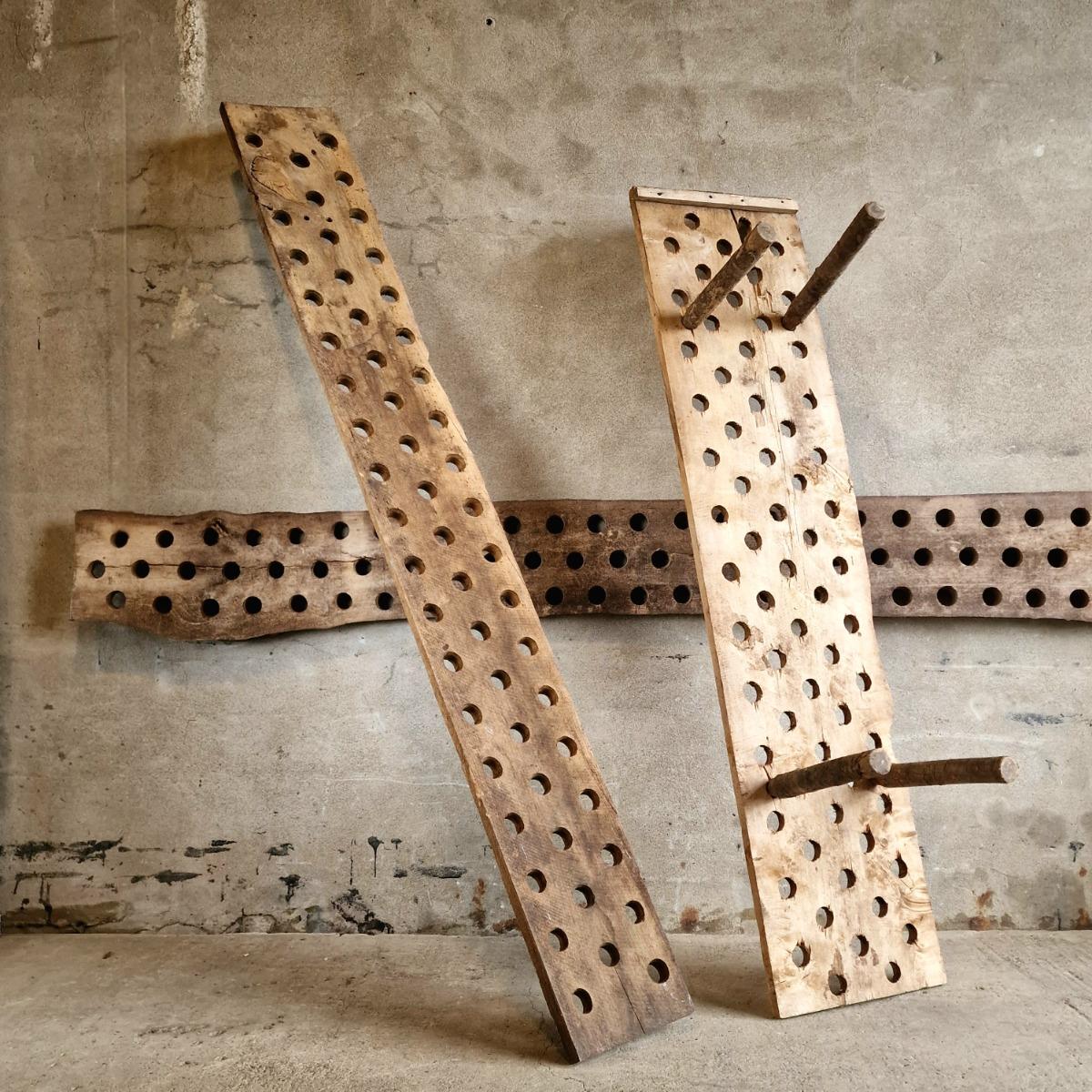 3 perforated wooden shelves