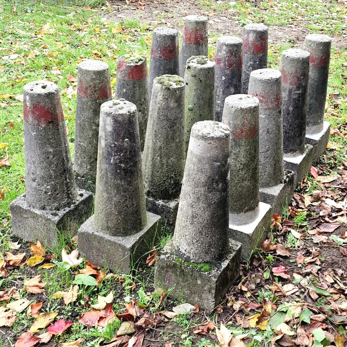 Collection of 15 cast stone land markers