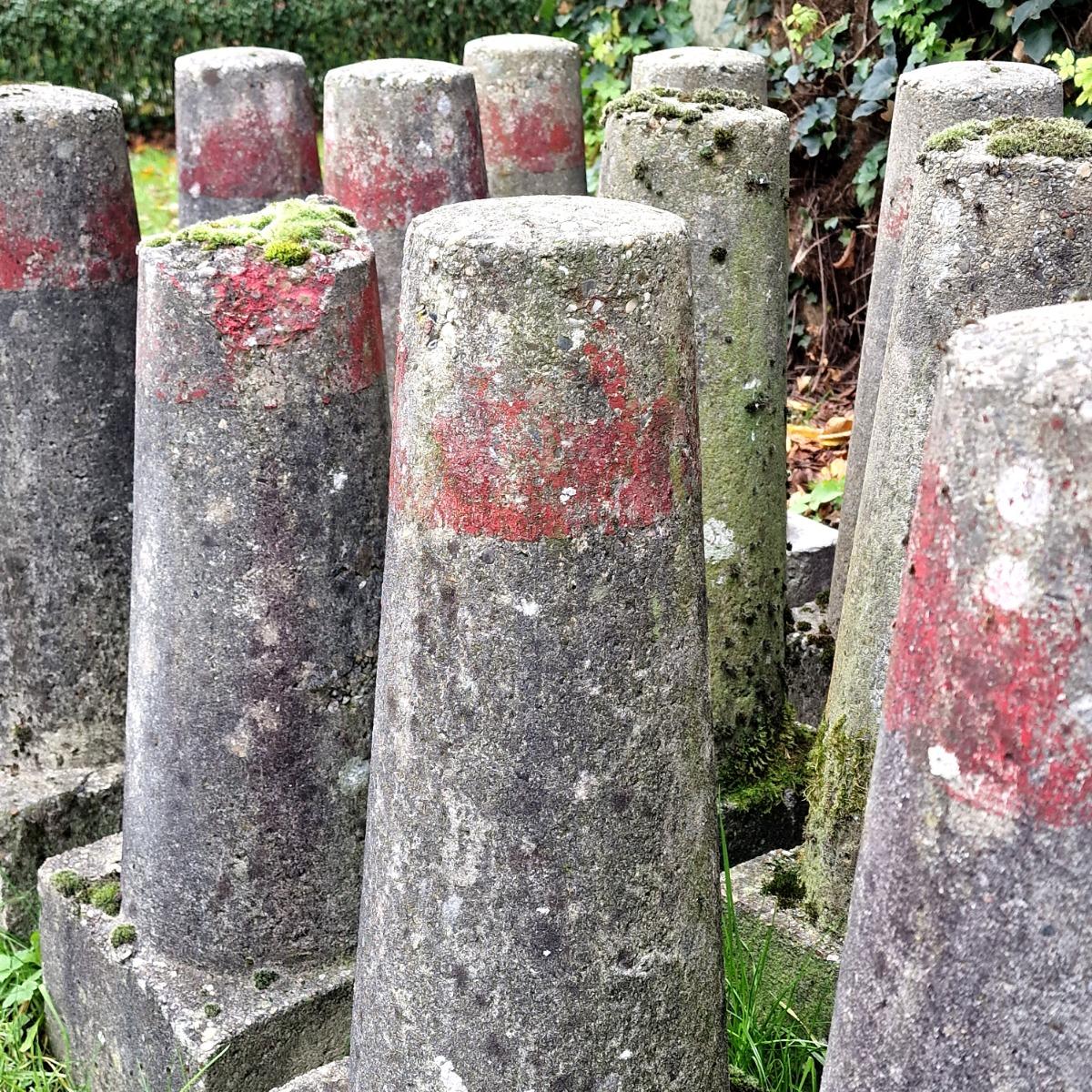 Collection of 15 cast stone land markers