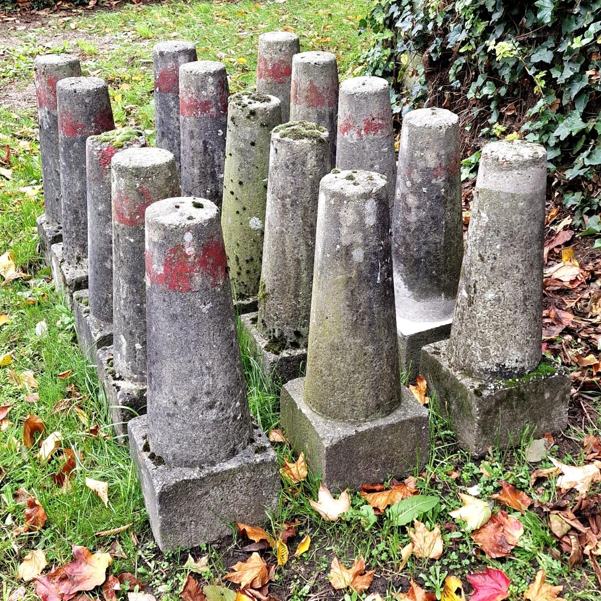 Collection of 15 cast stone land markers