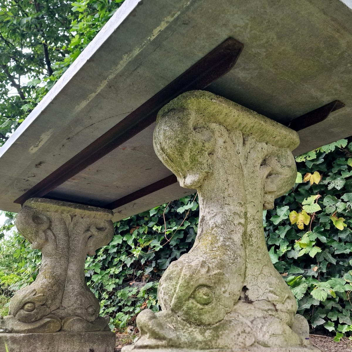 Impressive dolphin feet table