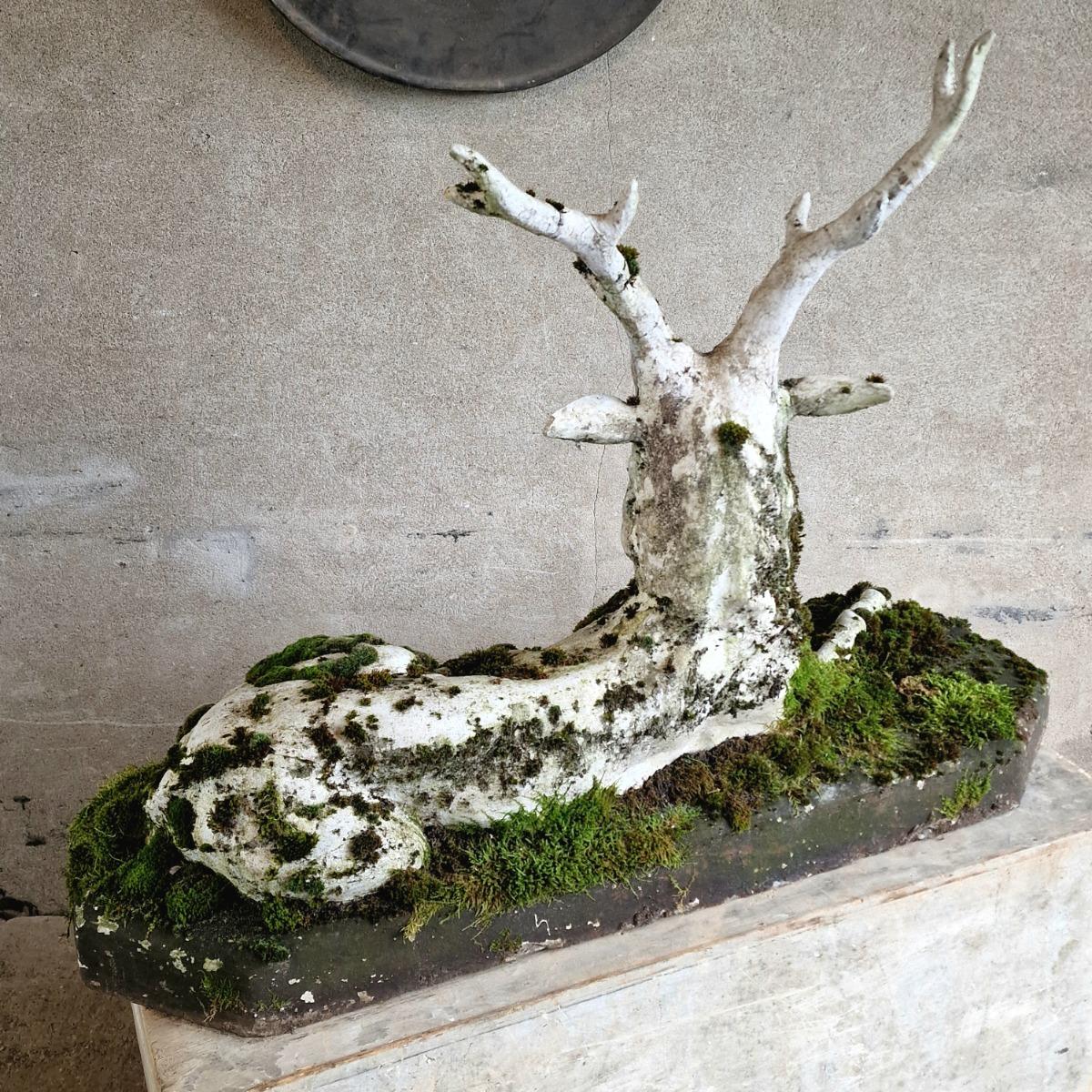 Mossy cast stone deer