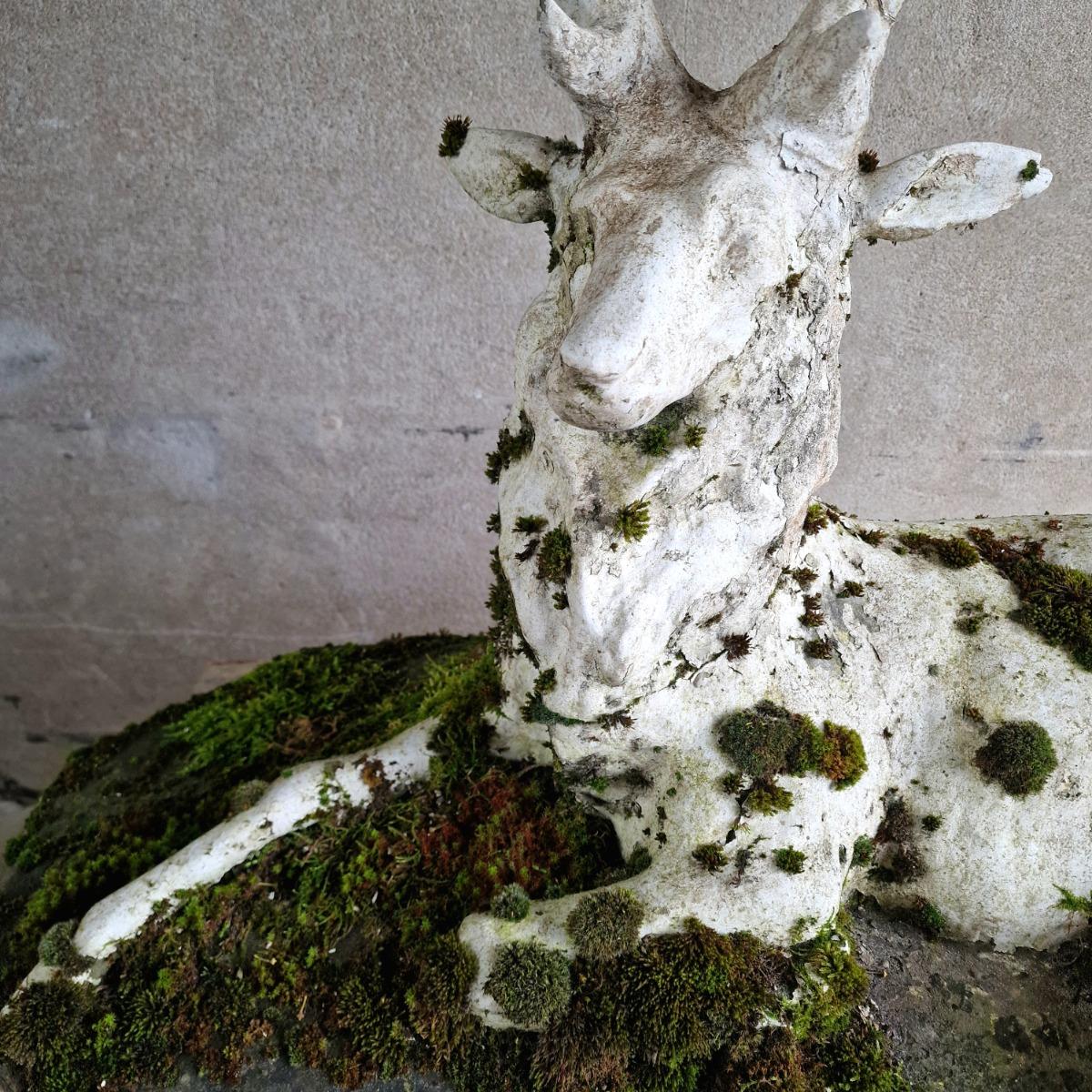 Mossy cast stone deer