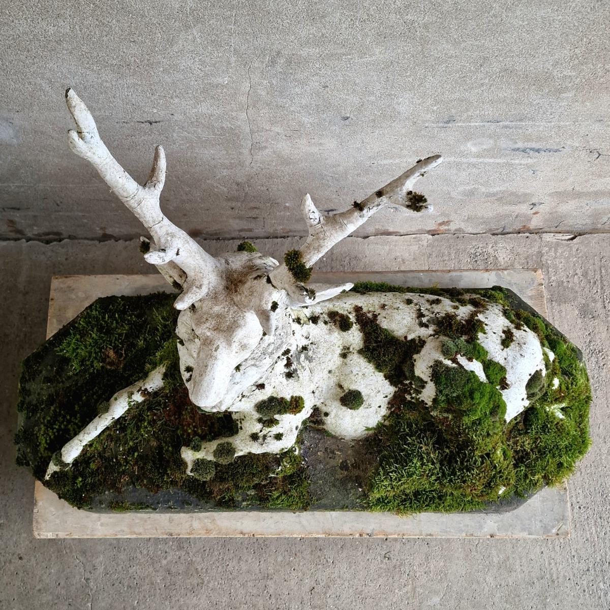 Mossy cast stone deer