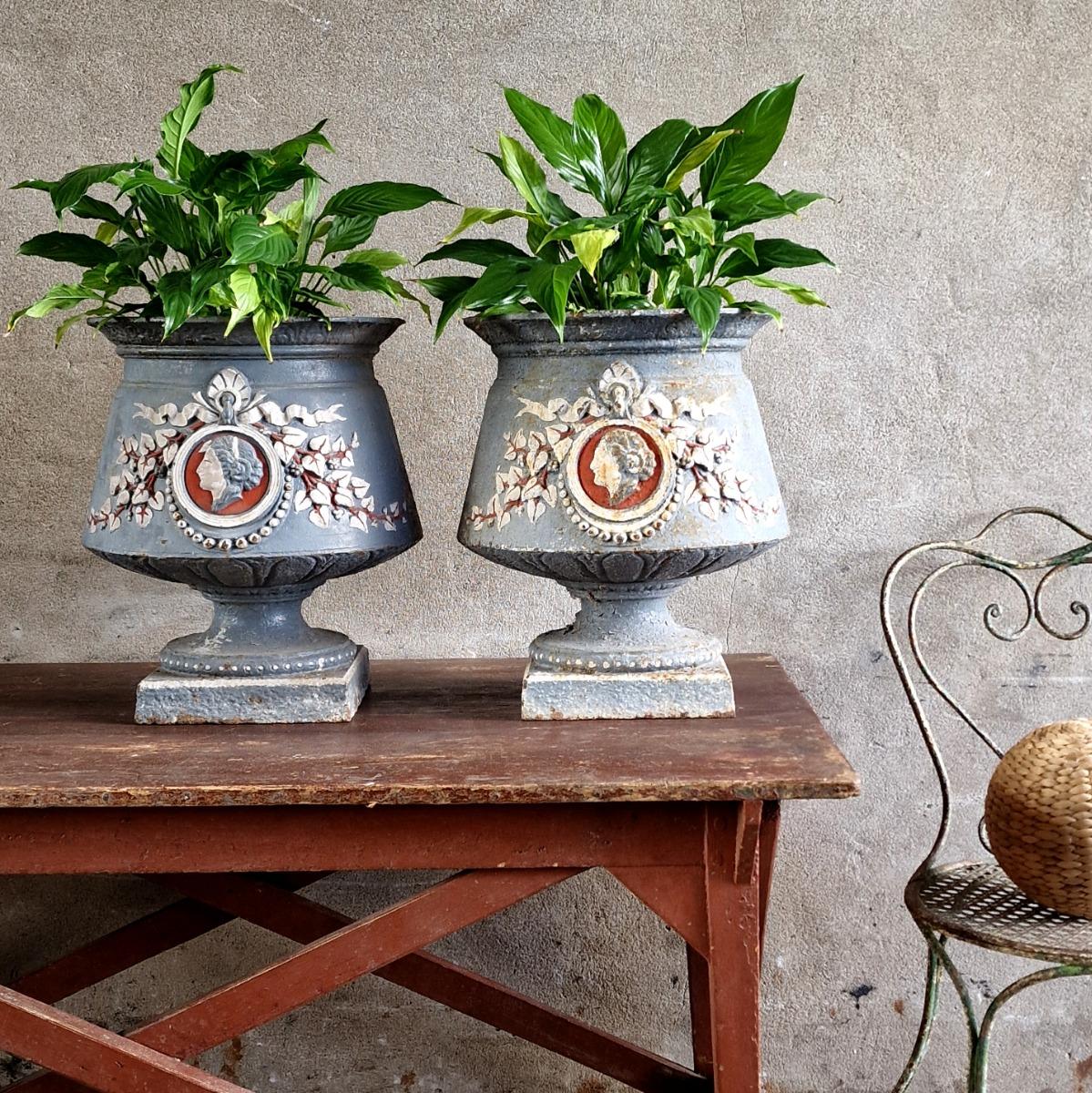 Pair of 19thC painted cast iron urns