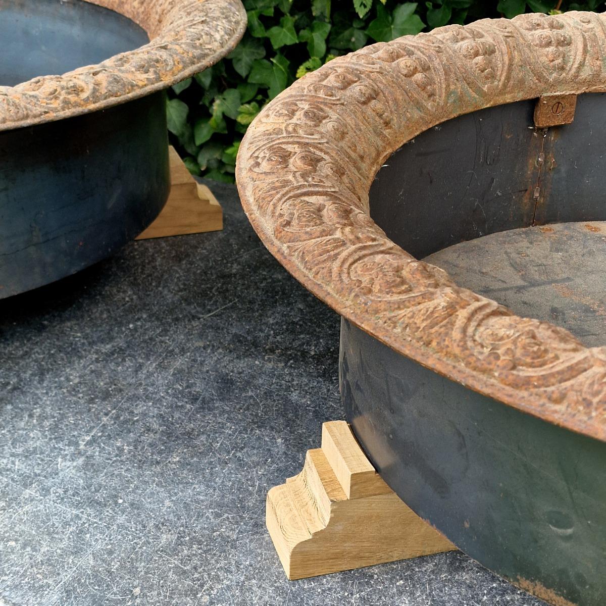 Pair of low cast iron planters