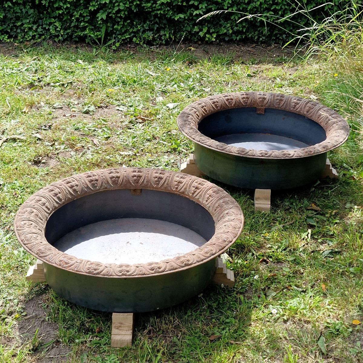 Pair of low cast iron planters