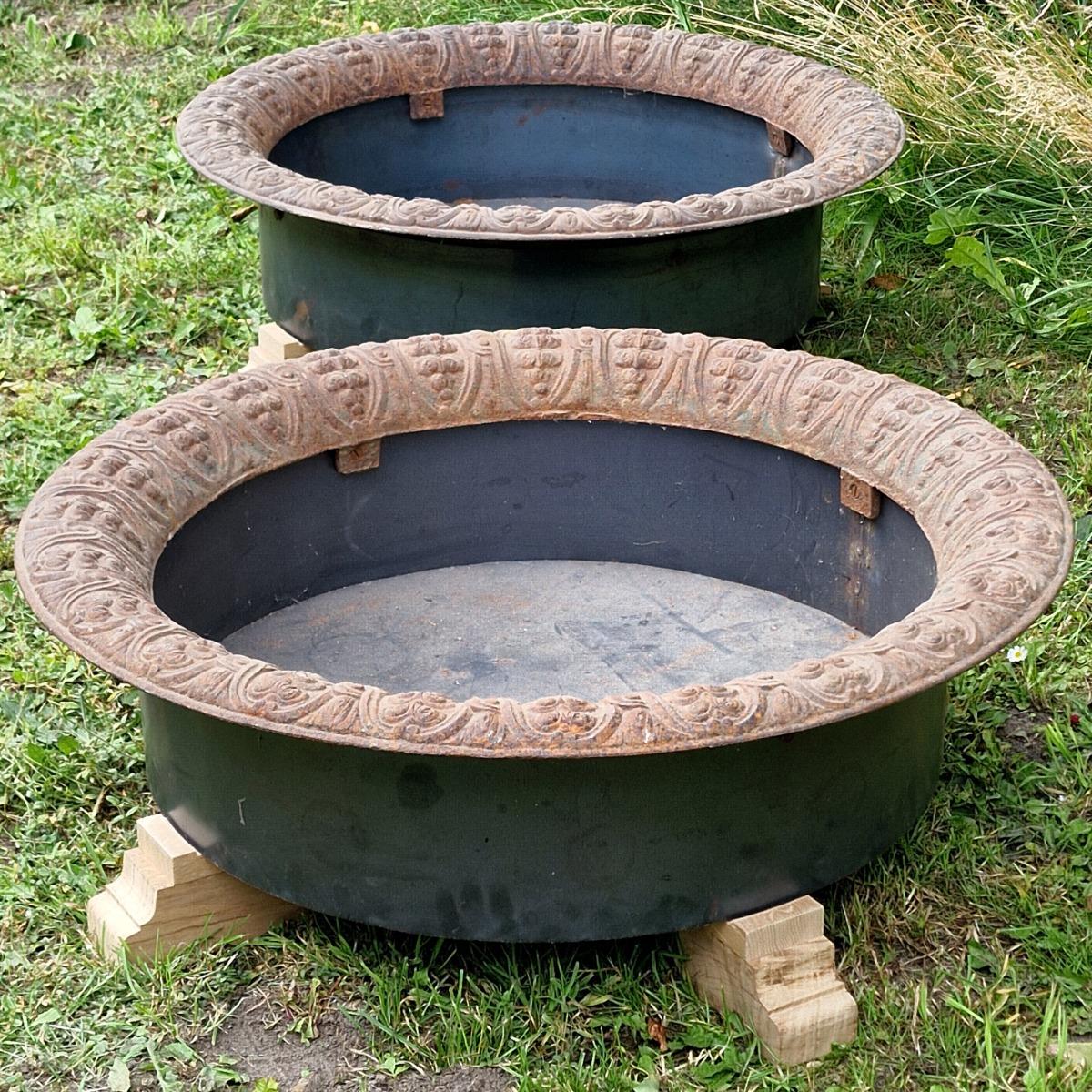 Pair of low cast iron planters