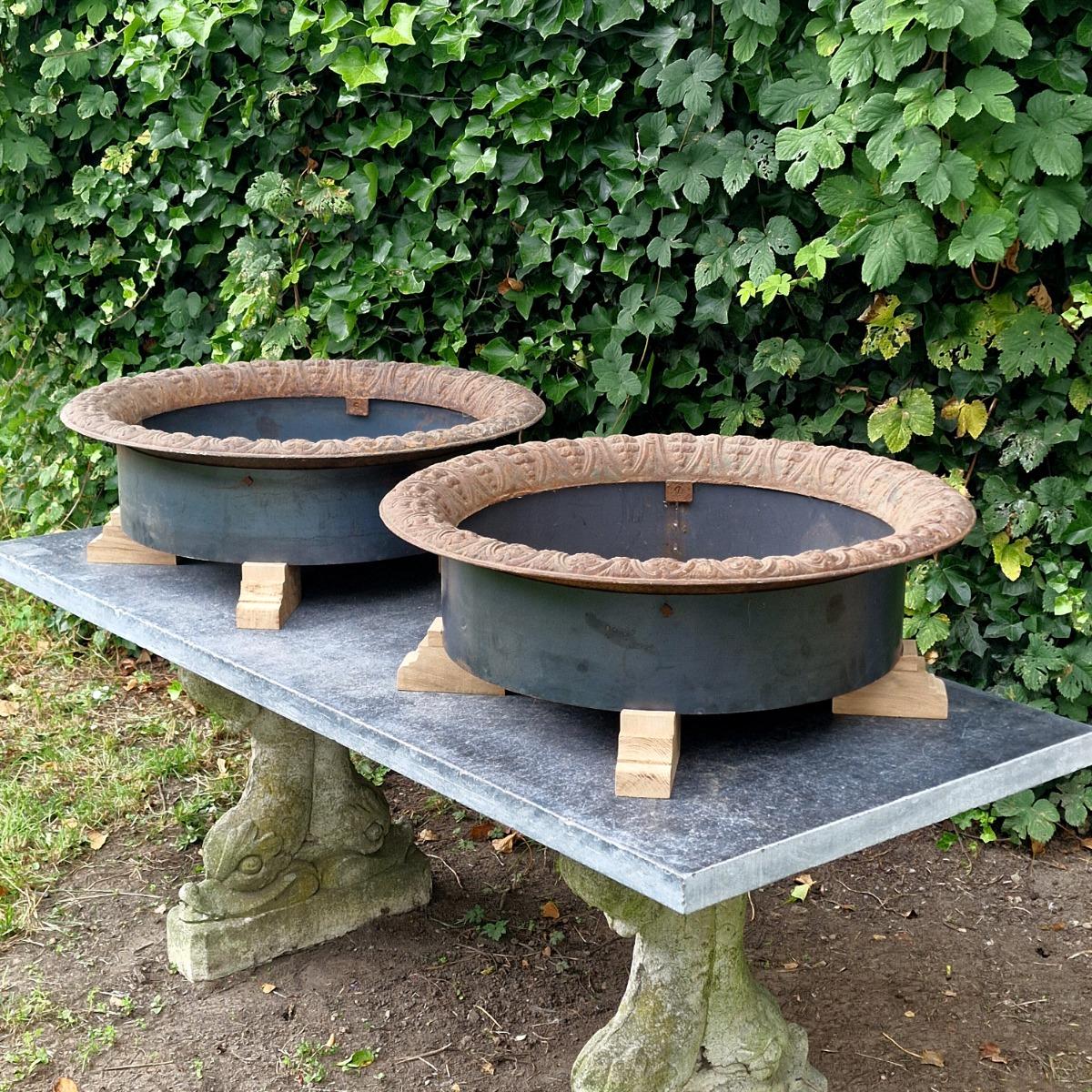 Pair of low cast iron planters