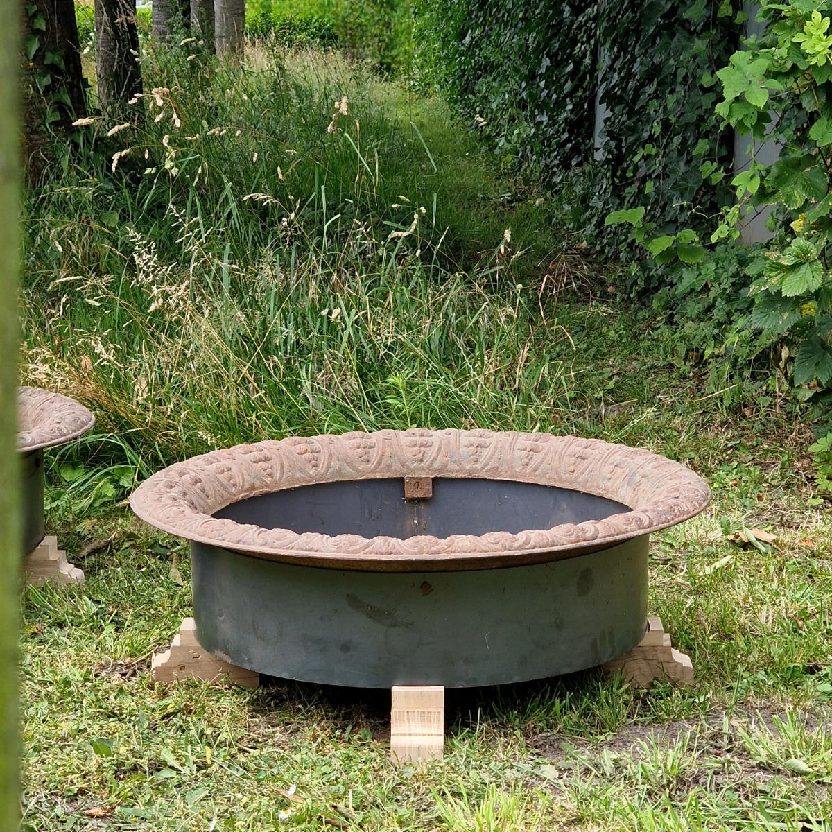 Pair of low cast iron planters