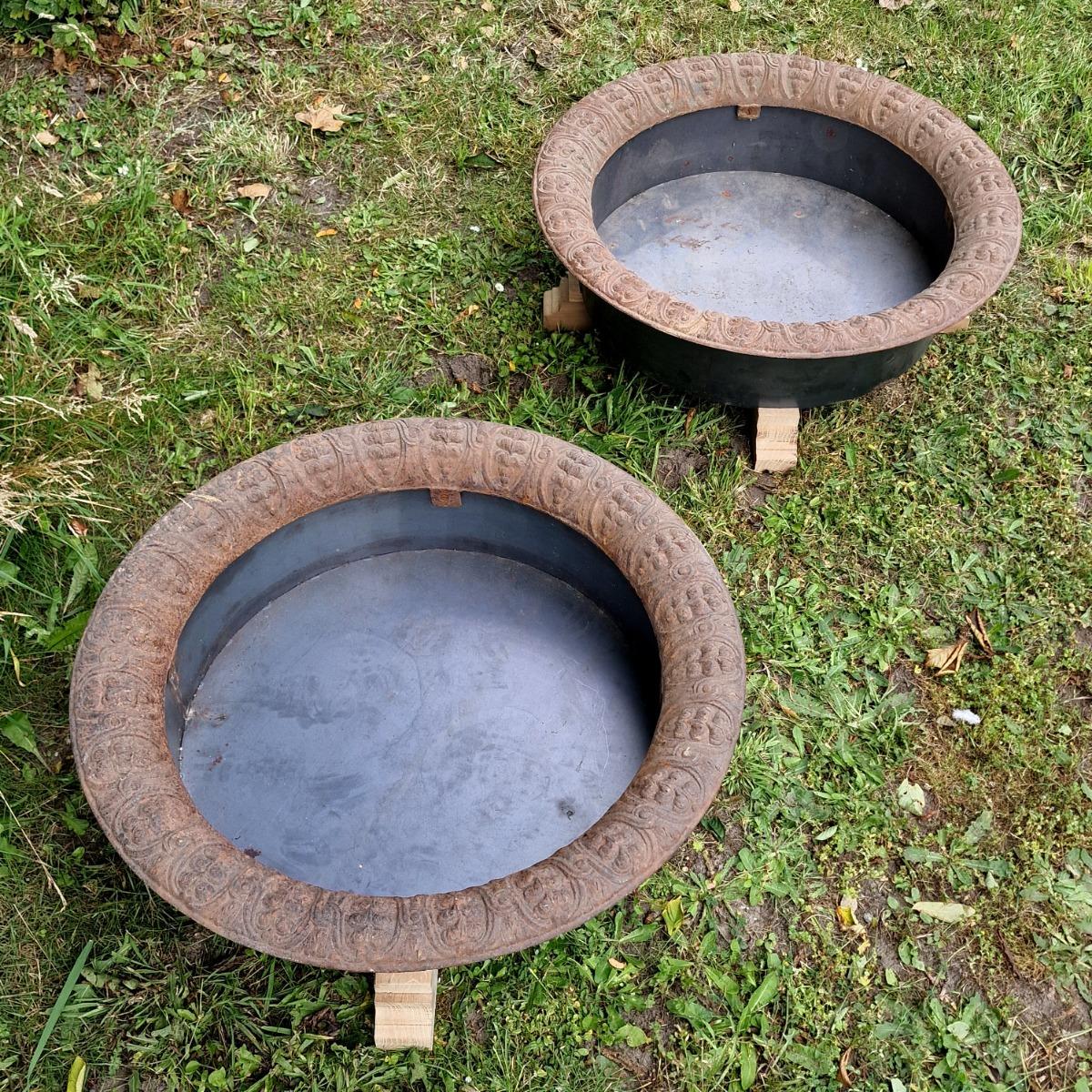 Pair of low cast iron planters