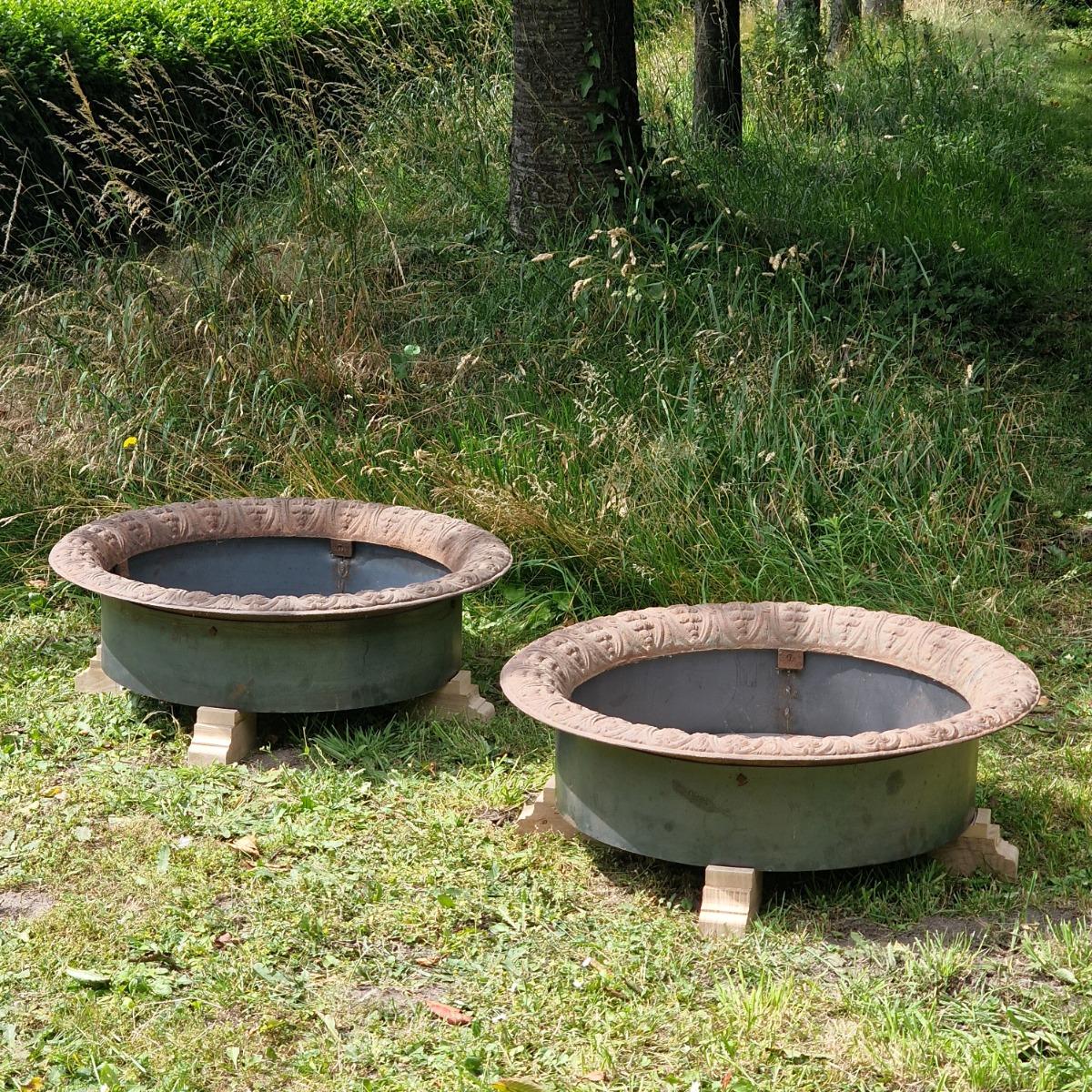 Pair of low cast iron planters